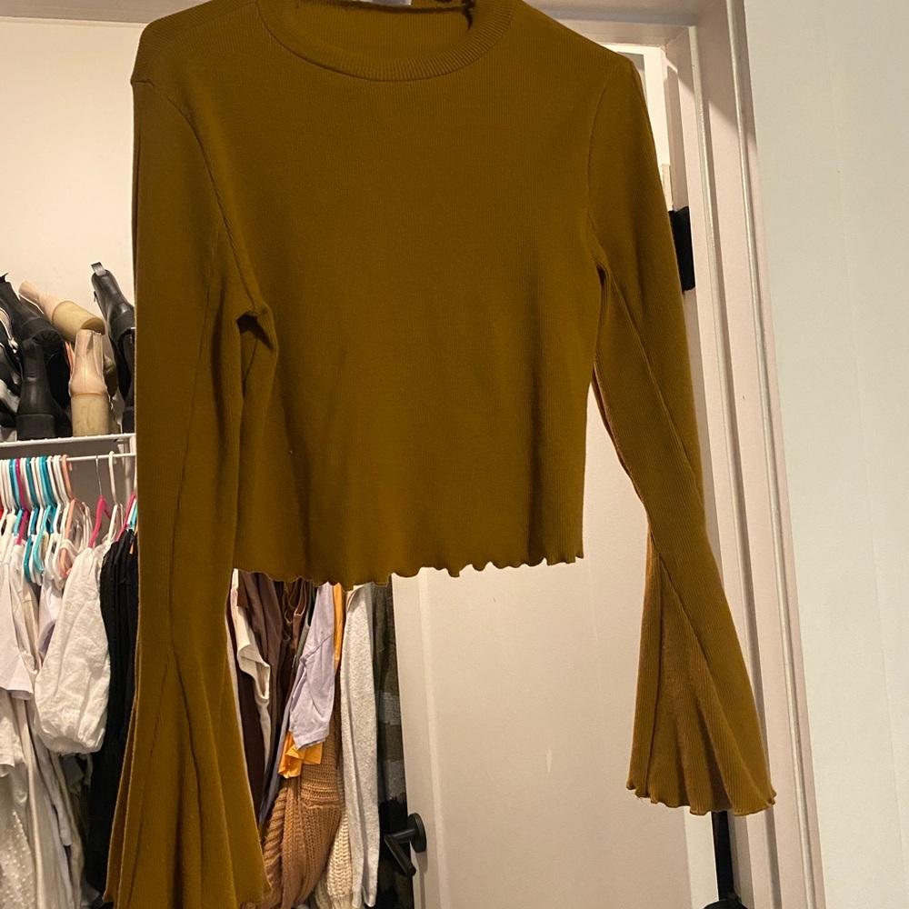 Vestique bell sleeve top